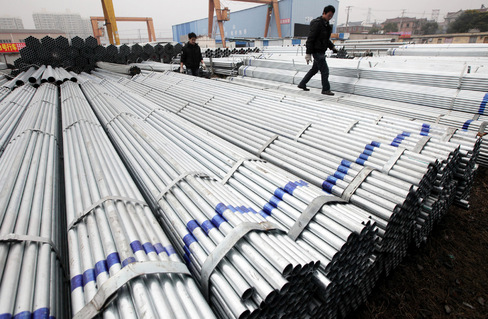 Steel Pipes Are Stockpiled At A Trading Firm